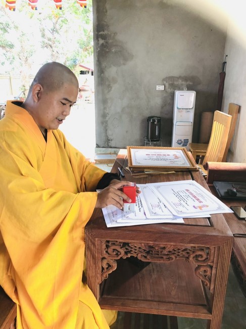 Dong Cao Pagoda granting the merit certificate to Buddhists having  the design of Lumbini garden at home.